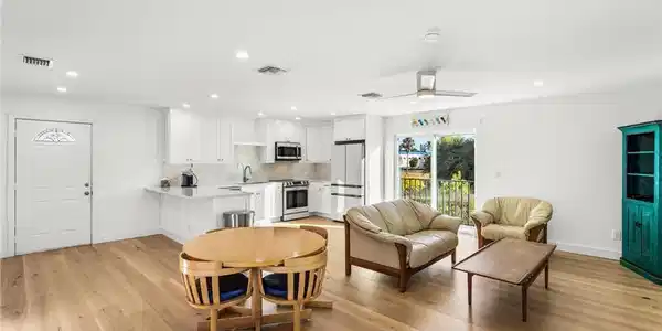 Image 3: Dining area featuring recessed lighting, a ceiling fan, and light wood floors
