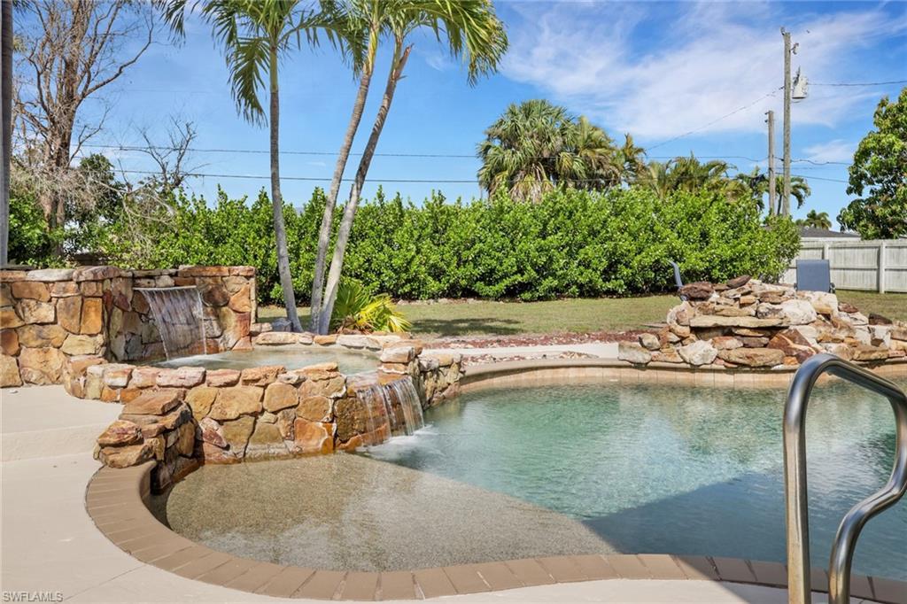 Image 4: View of pool with patio surround