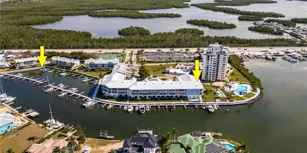 Image 4: View of property location with a marina and a nearby body of water