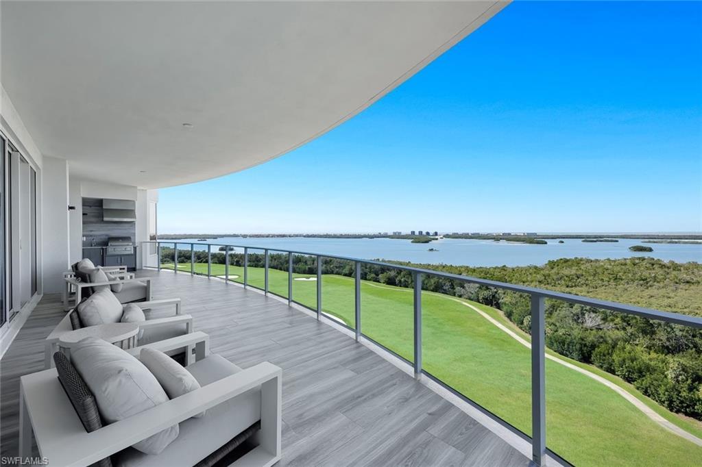 Image 4: Expansive lanai space with gas grill and sink.