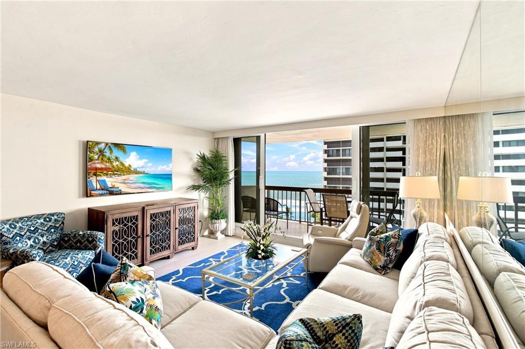 Image 4: comfortable beachfront living with views of the Gulf and lovely sunsets from the air conditioned comfort of your living room