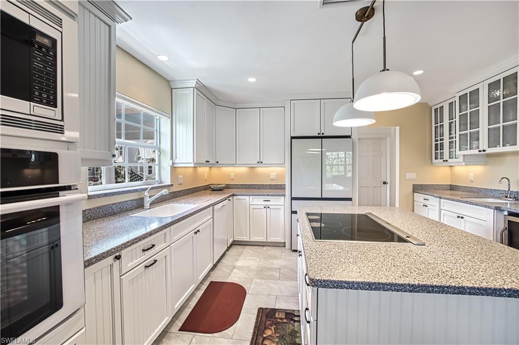 Image 3: Kitchen, With Glass Insert Cabinets, Island