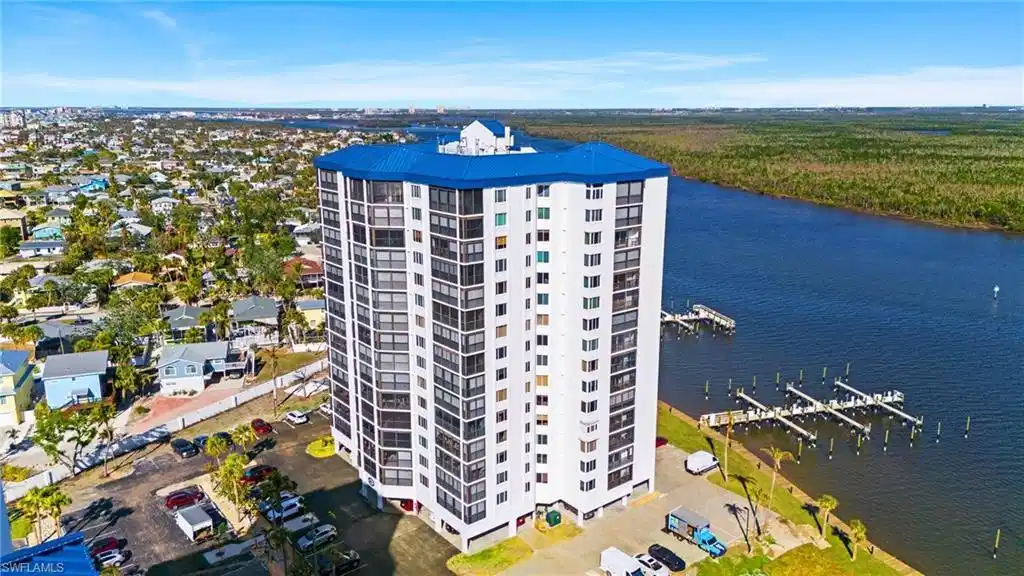 Image 1: Drone / aerial view with a water view virtually enhanced image