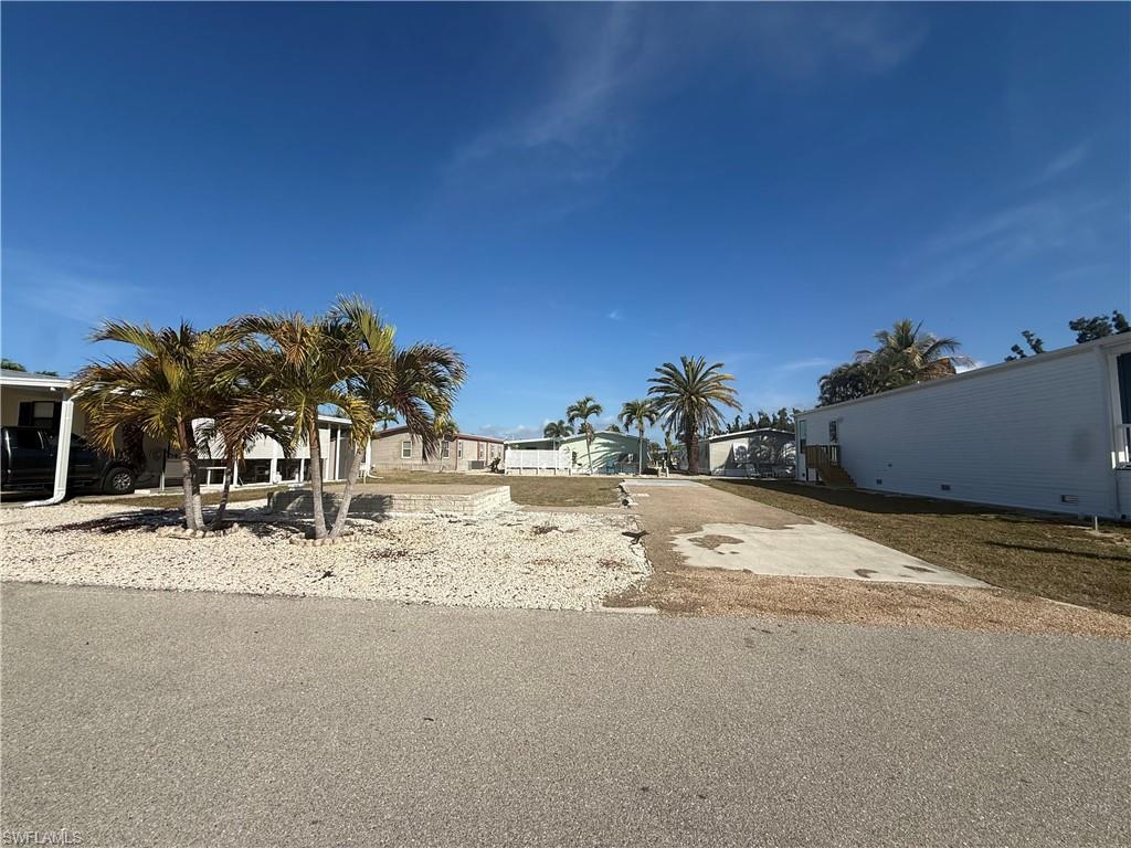 Image 2: View of yard with a residential view