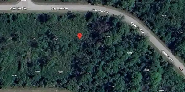 Image 3: Aerial overview of property's location featuring property parcel outlined