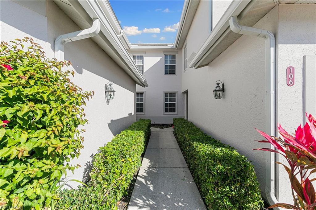 Image 4: Doorway to property with stucco siding