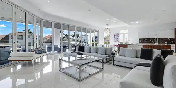 Image 4: Expansive living area with Thassos marble floors, Solar Innovations glass doors