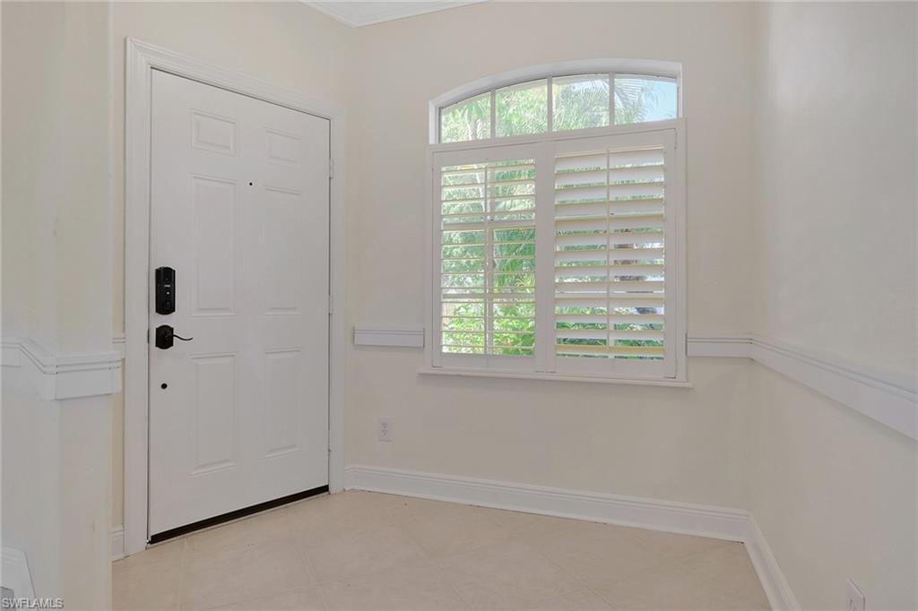 Image 3: Foyer entrance featuring baseboards