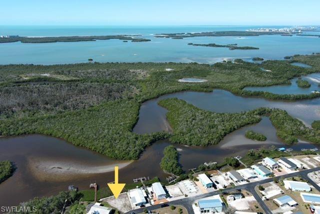 Image 4: View of property location with a nearby body of water