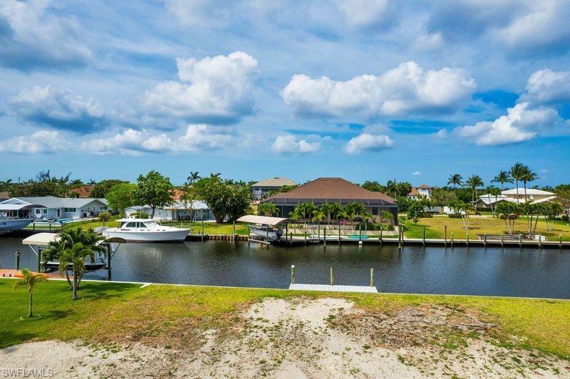Image 3: Water view featuring nearby suburban area
