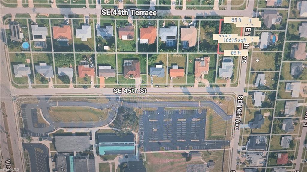 Image 3: Aerial view of property's location featuring property boundaries highlighted