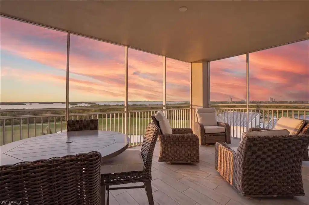 Image 1: The screened lanai is the perfect spot for lounging with a cocktail or a glass of your favorite wine while watching the glorious sunset over the Gulf!