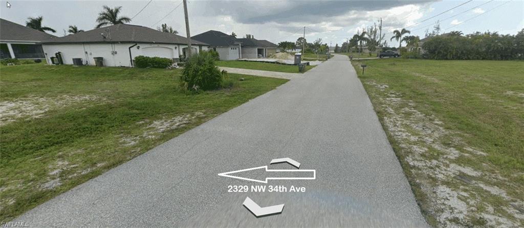 Image 2: View looking down street.