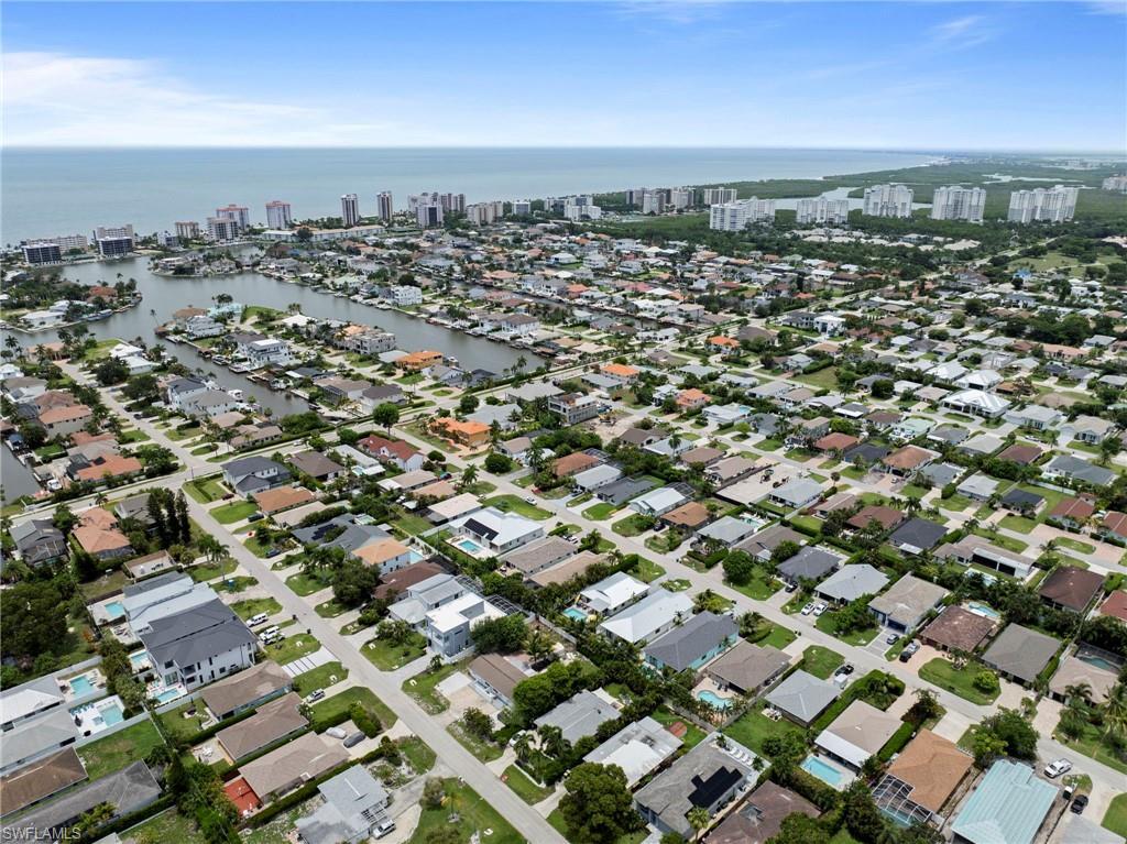 Image 3: Aerial perspective showcasing a residential community with numerous properties