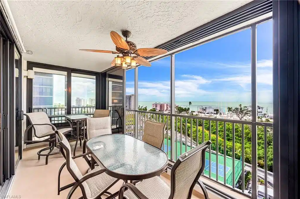Image 1: Sunroom / solarium featuring a water view and ceiling fan