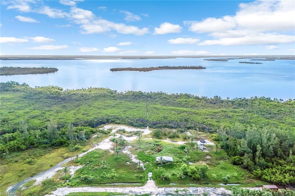 Image 2: View of property location featuring a nearby body of water