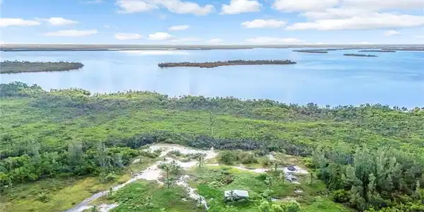 Image 2: View of property location featuring a nearby body of water