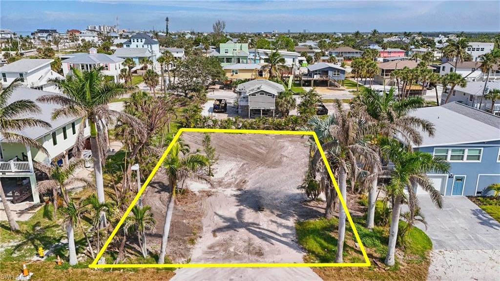 Image 4: Aerial view of residential area with property boundaries