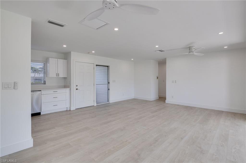 Image 4: Unfurnished room featuring a ceiling fan, light wood-type flooring, and recessed lighting