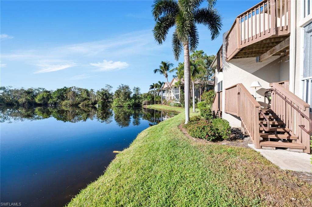 Image 4: Back of home looking at water and deck