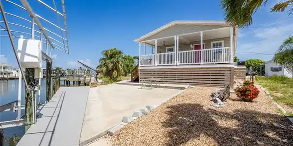 Image 2: Canal front dock and boat lift for easy fun on the water.