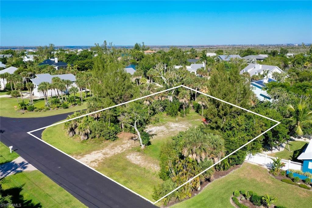 Image 2: Aerial view of residential area featuring property boundaries highlighted