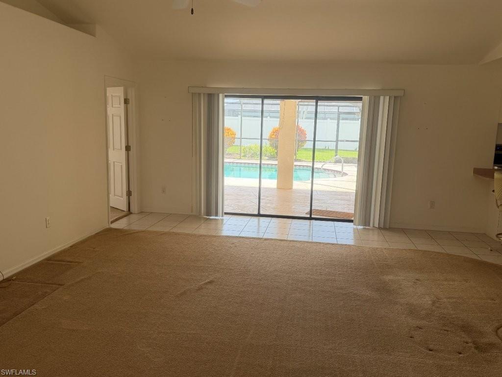 Image 4: Large slider access out to the pool deck!