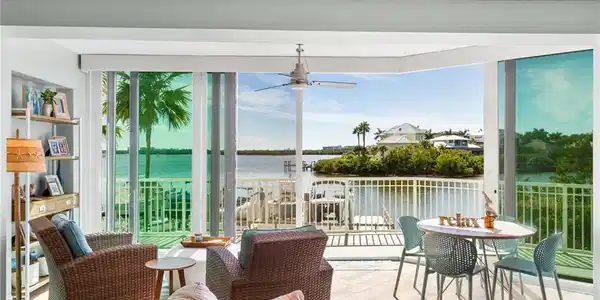 Image 4: Great Room was extended-sliders lead you to the open balcony