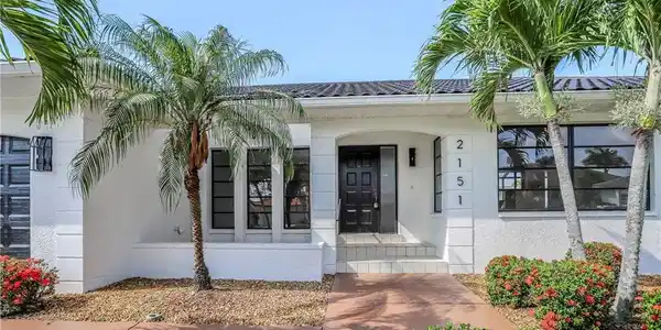 Image 3: Charming exterior with bright natural light