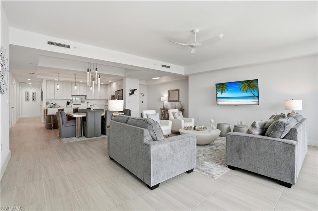 Image 4: Open concept Living area Virtually Edited