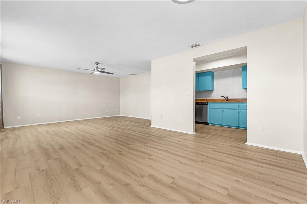Image 3: remodeled spacious living/dining area w/new LVP.