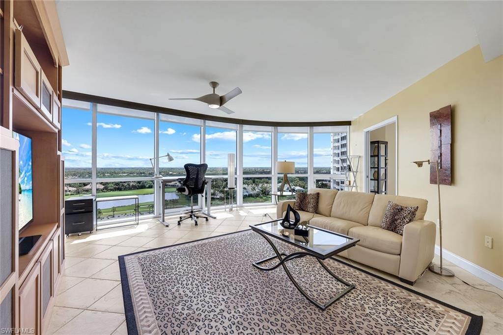 Image 2: Third bedroom is currently being utilized as an office featuring floor-to-ceiling windows,  STUNNING golf course and lake views, open yet intimate spaces - this home is absolutely lovely!