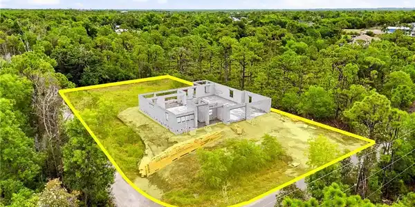 Image 2: Aerial view of the spacious homesite at 5288 Fairbanks Drive.