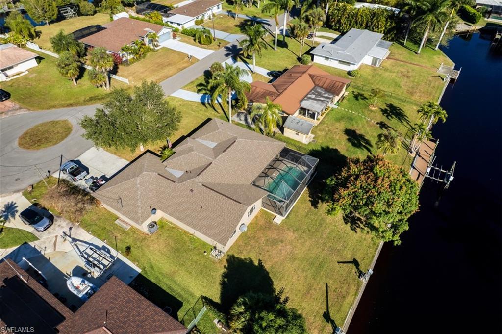 Image 3: View of property location featuring nearby suburban area and a nearby body of water
