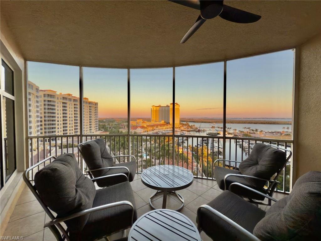 Image 1: Screened Lanai with ceiling fan and a marina water view