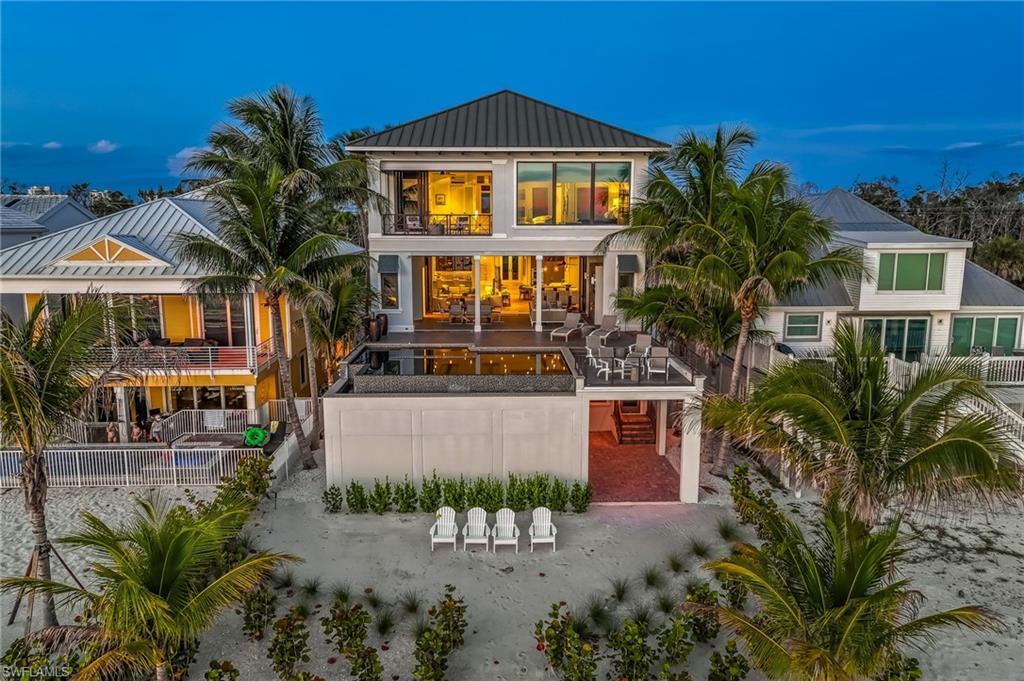 Image 2: Rear of home at sunset