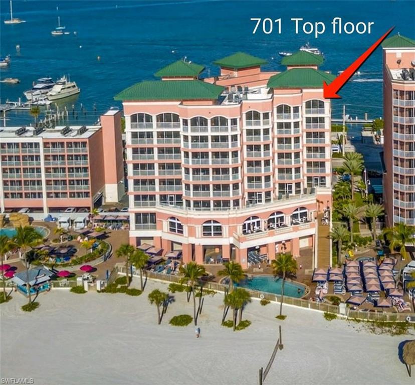 Image 2: View of apartment building / complex with a water view