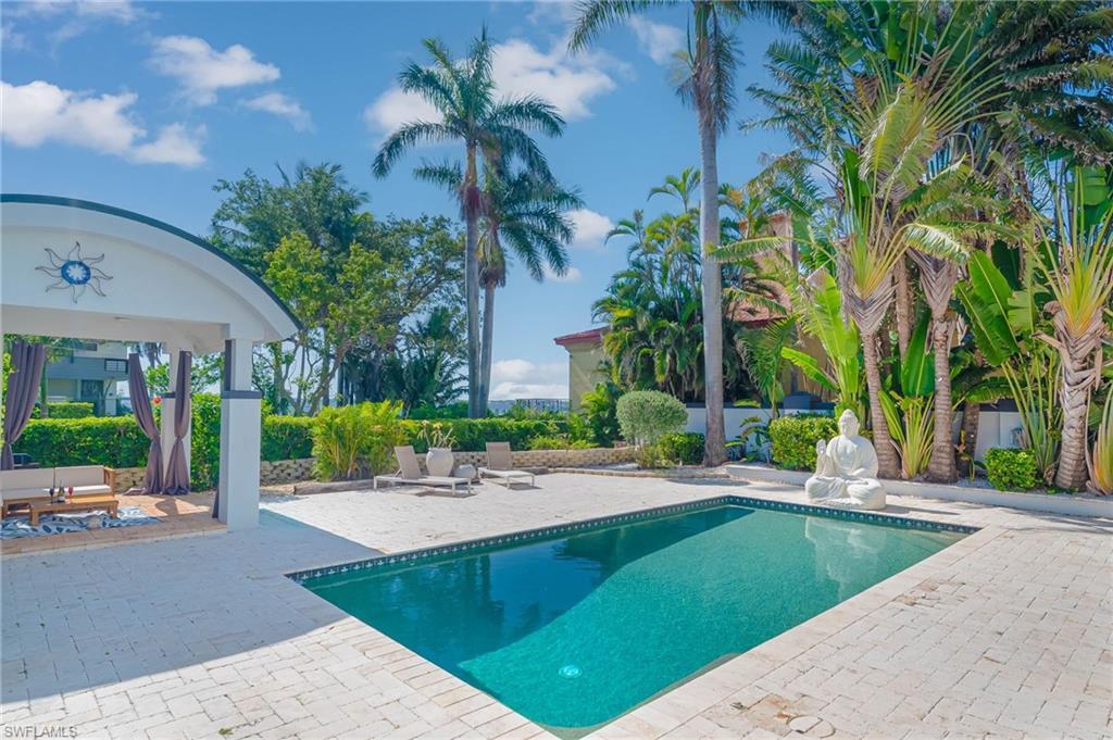 Image 4: Outdoor pool featuring a patio
