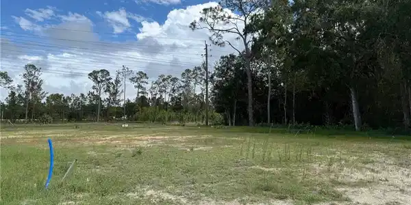 Image 2: Expansive land parcel featuring existing utility infrastructure