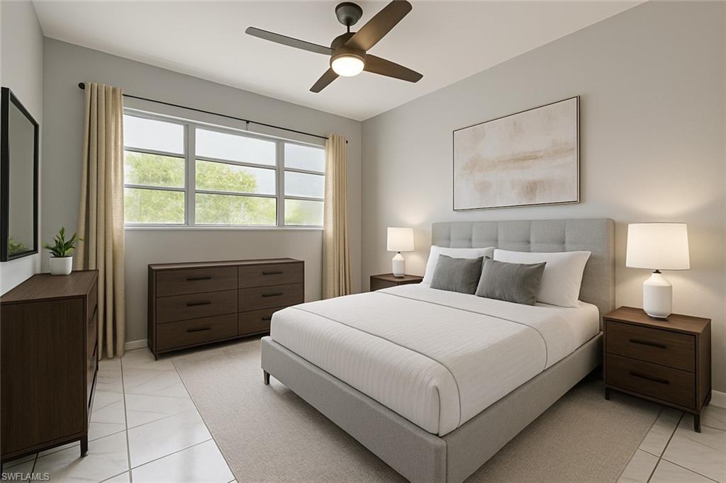 Image 2: Bedroom with ceiling fan and light tile patterned floors