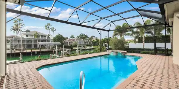 Image 4: Southern exposure with sun on spacious pool