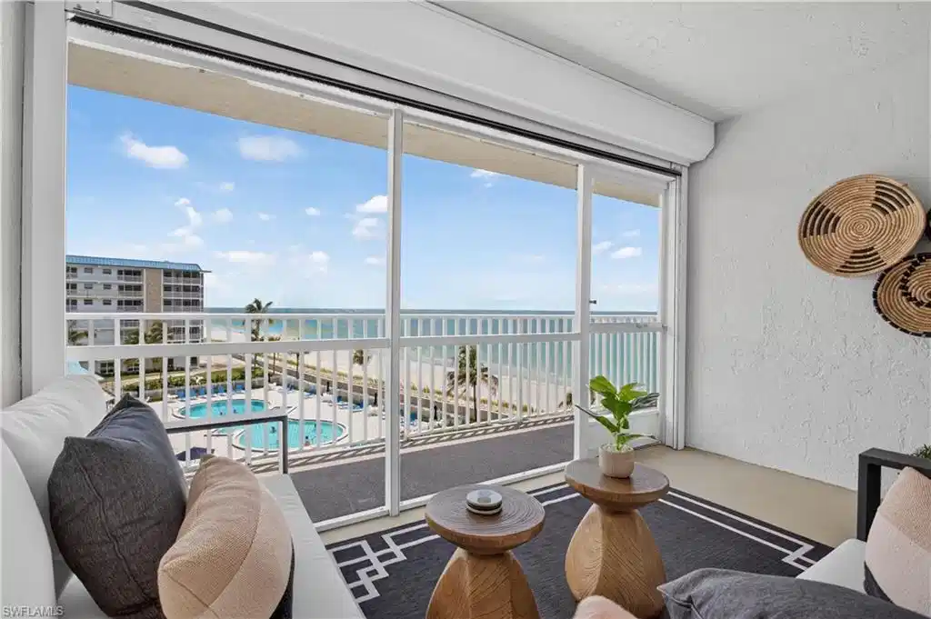 Image 1: Spacious balcony with stunning views and electric storm screens.