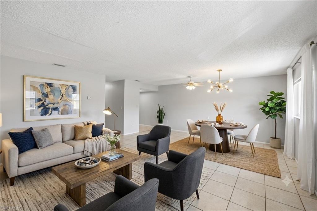 Image 3: Virtually staged photo showing living and dining area.