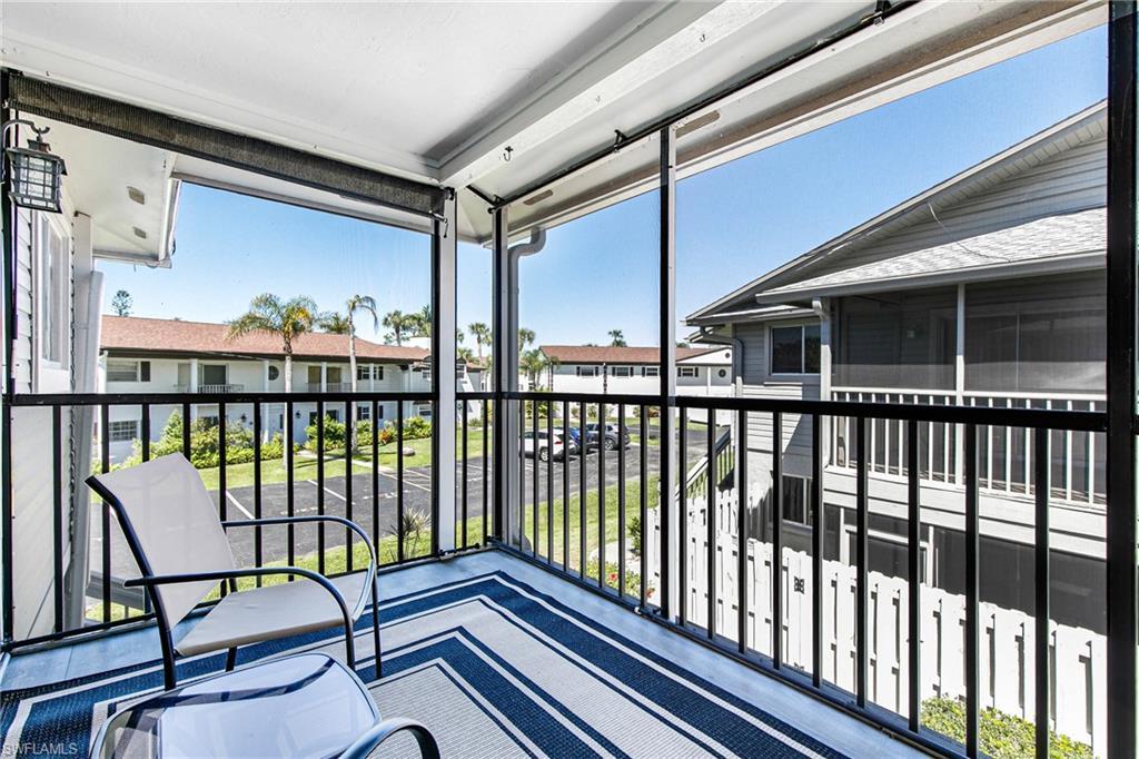 Image 2: Balcony featuring a sunroom