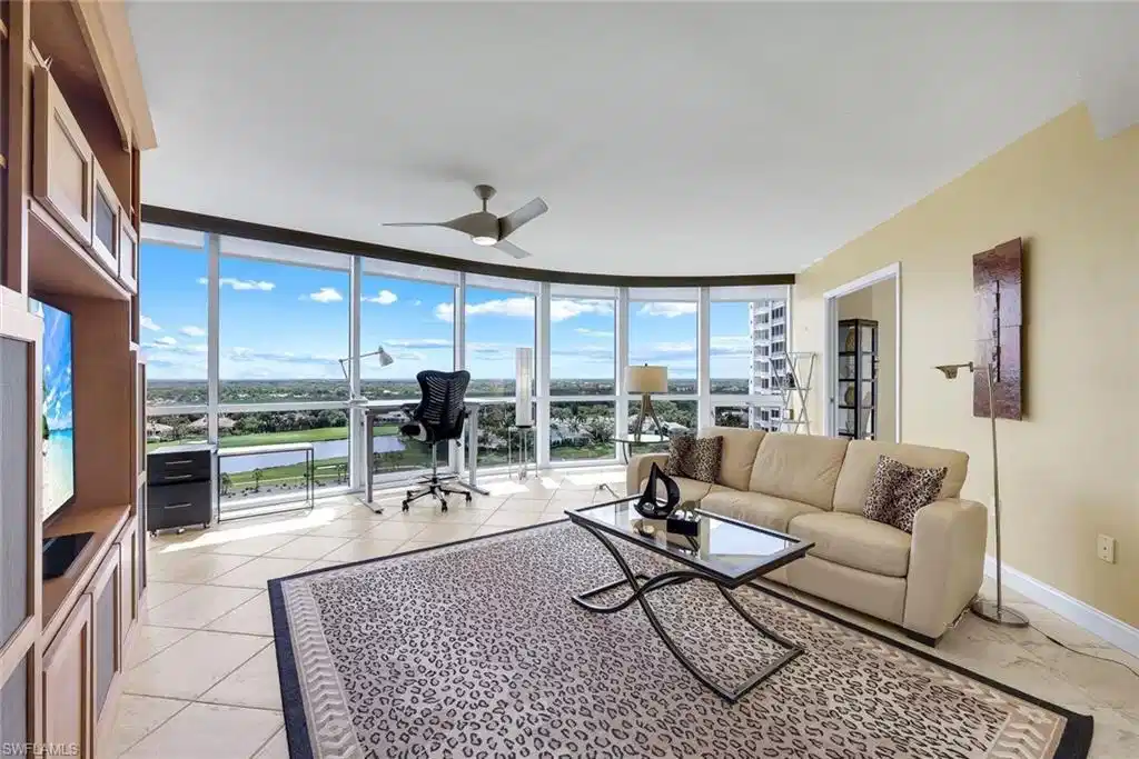 Image 1: Third bedroom is currently being utilized as an office featuring floor-to-ceiling windows,  STUNNING golf course and lake views, open yet intimate spaces - this home is absolutely lovely!