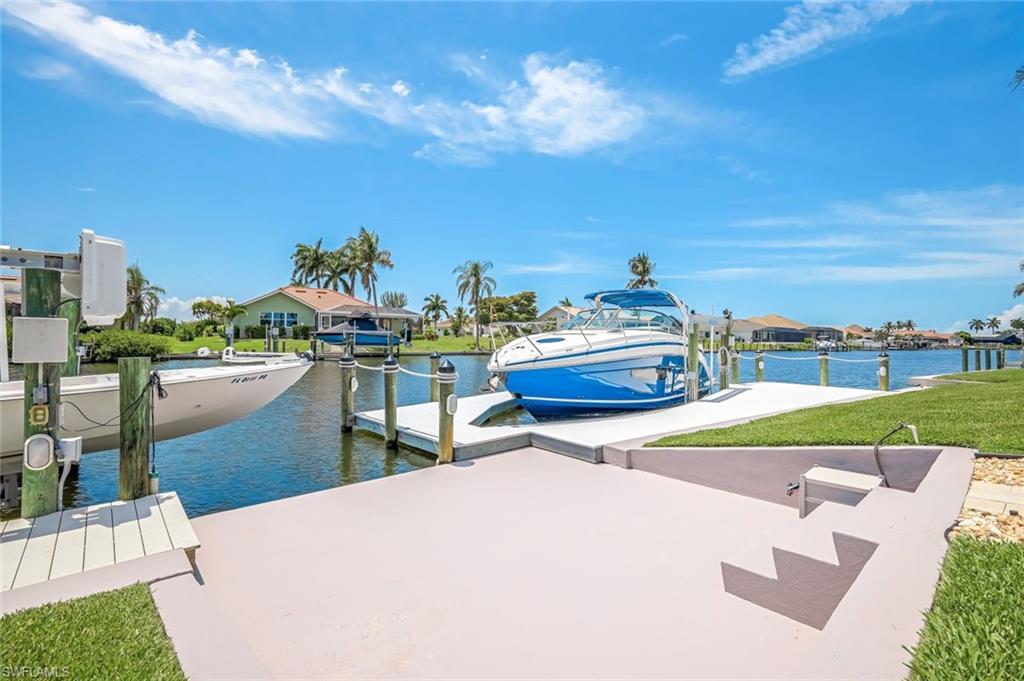 Image 2: Two docks with Trex deck, larger dock with wrap around decking. 16,000 lb. and 5,000 lb lifts.