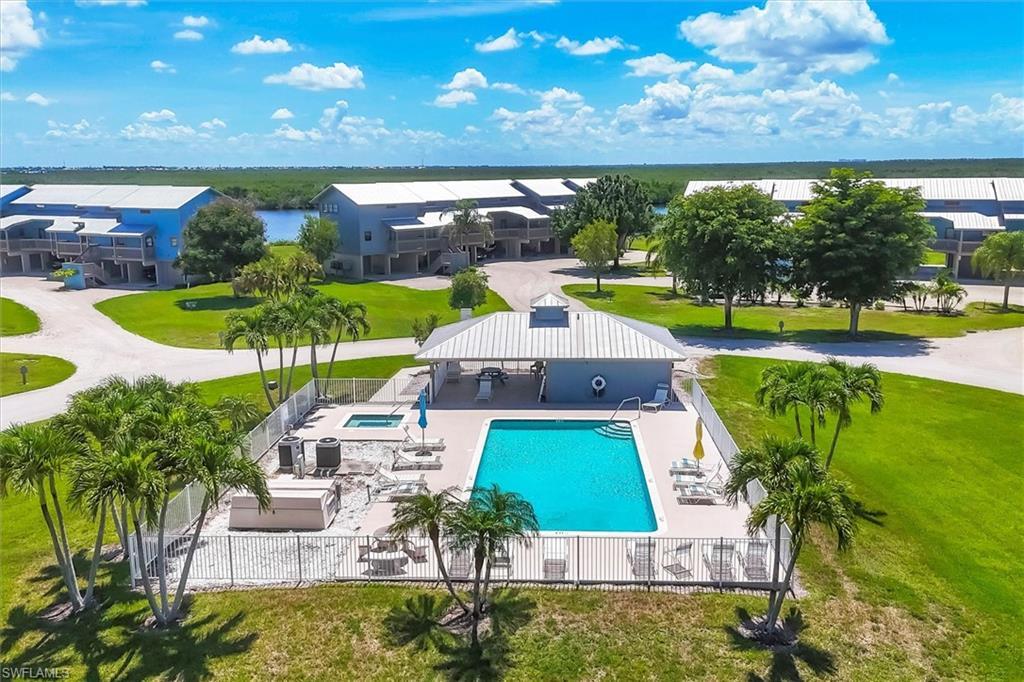 Image 2: Pool and Club House are just steps away from your door!