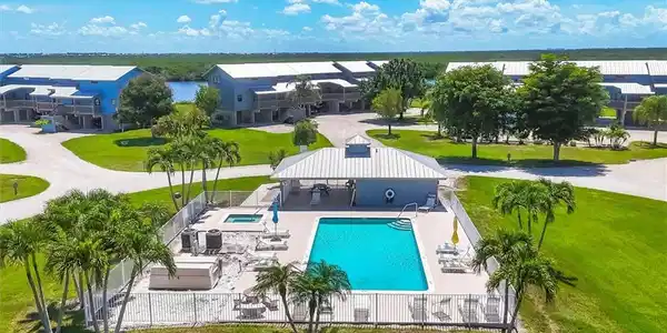 Image 2: Pool and Club House are just steps away from your door!