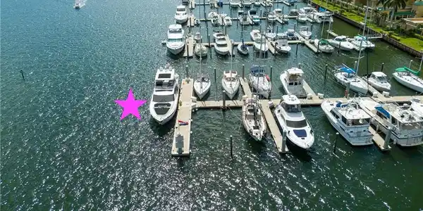 Image 2: Aerial view of a nearby body of water and a marina