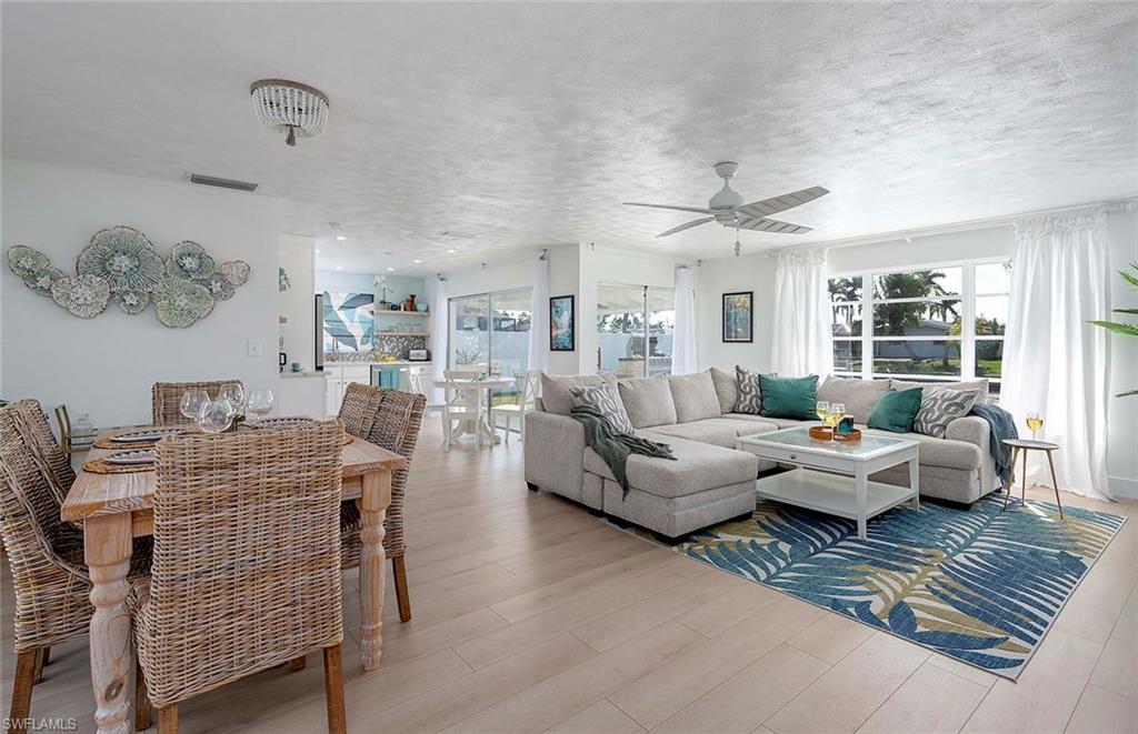 Image 3: Dining Room and Living Room